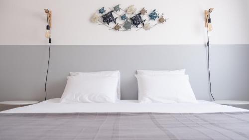 Ένα ή περισσότερα κρεβάτια σε δωμάτιο στο Perfect Shore Guest House