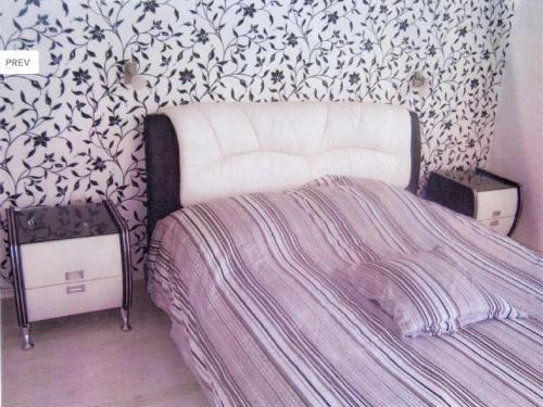 Postel nebo postele na pokoji v ubytování Apartment Rich