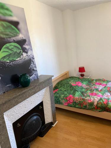 Postel nebo postele na pokoji v ubytování Appartement de la nation 2