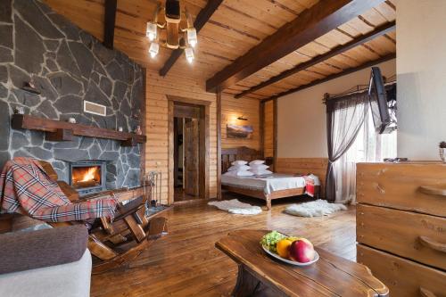 Postel nebo postele na pokoji v ubytování Apart-hotel Vershina