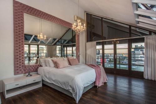 Cama o camas de una habitación en Manhattan Lofts