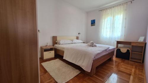 Postel nebo postele na pokoji v ubytování Apartment Antonia