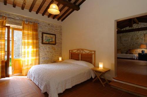 Postel nebo postele na pokoji v ubytování Agriturismo Montecchio