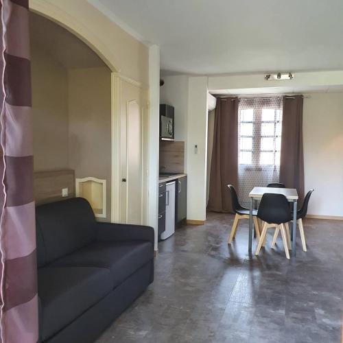 Posezení v ubytování Auberge de la Tour -Appartements-