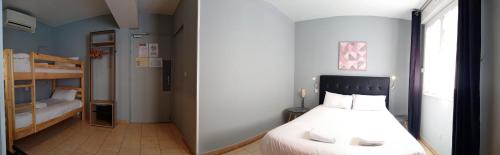 Ένα ή περισσότερα κρεβάτια σε δωμάτιο στο Hotel Astoria