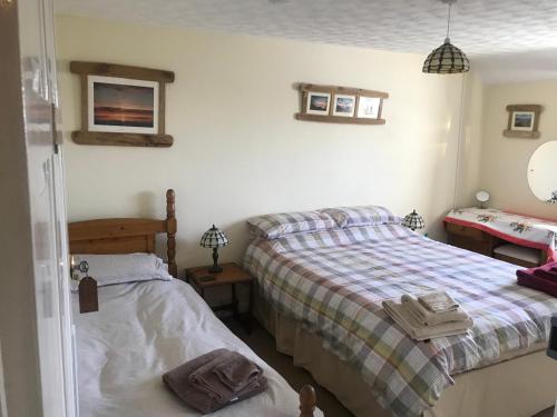 Ένα ή περισσότερα κρεβάτια σε δωμάτιο στο Stoke House Bed and Breakfast