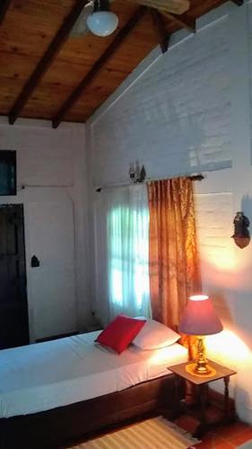 Postel nebo postele na pokoji v ubytování Villa de las Palmas de Rozo Palmira