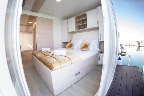 Postelja oz. postelje v sobi nastanitve Adria Portorož Luxury Houseboat