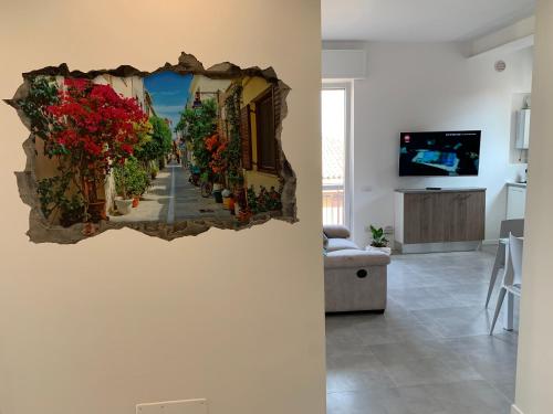 Μια τηλεόραση ή/και κέντρο ψυχαγωγίας στο Comfort Apartment Verona