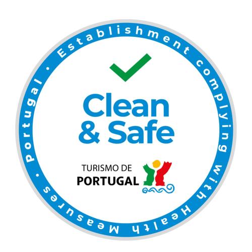 a logo for clean and safe at Casa Tedi, Alto do Perogil, Tavira - 3 Bedroom, 3 Bathroom villa, large Pool, exquisite Gardens & Air-conditioning in Tavira