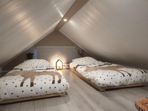Säng eller sängar i ett rum på Guesthouse 'Lodge Lagom' ~ Hammarstrand-Jämtland
