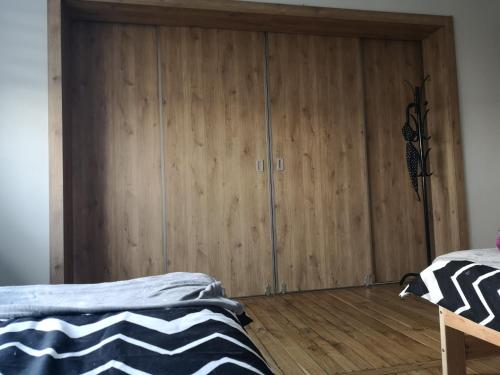 Postel nebo postele na pokoji v ubytování Wrota Biebrzy