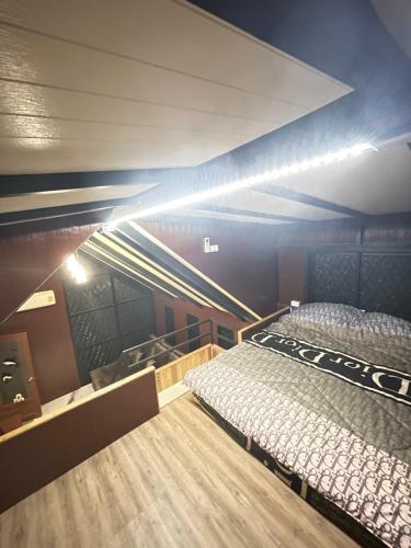 Ένα ή περισσότερα κρεβάτια σε δωμάτιο στο Noree Jacuzzi House