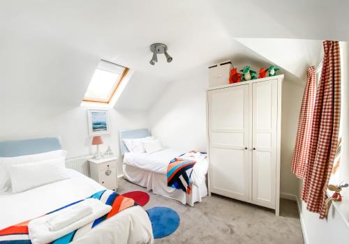 Katil atau katil-katil dalam bilik di Pen Y Bont Cottage