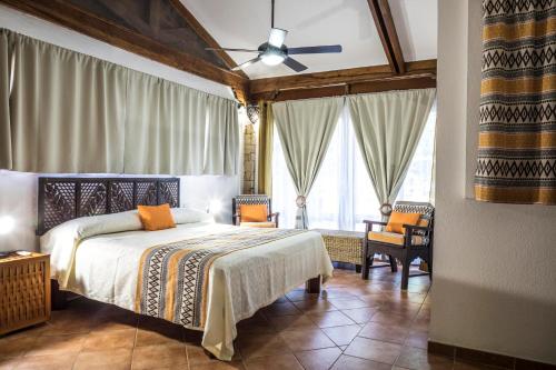 Кровать или кровати в номере Villas Kalimba