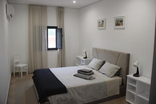 Postel nebo postele na pokoji v ubytování Quinta do Sr. Cabrita