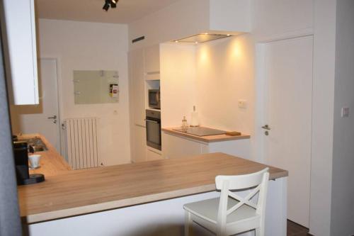 Kuchyňa alebo kuchynka v ubytovaní Gîte le 44 - au calme avec jardin, proche de Namur