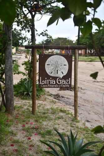 a sign for the latina global conservation center at Casa Liria Gael - Kite Is Surf School in Jericoacoara