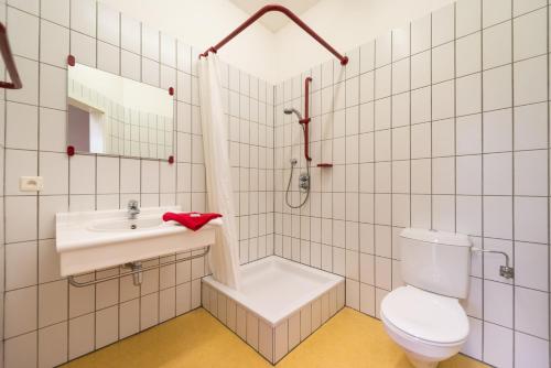 Et badeværelse på Atelier & Herberge ViDo