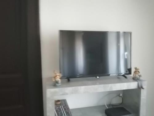 Artist Apartment TV 또는 엔터테인먼트 센터