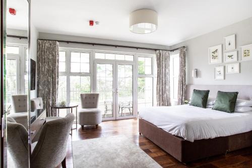 Llit o llits en una habitació de Millbrook Lodge