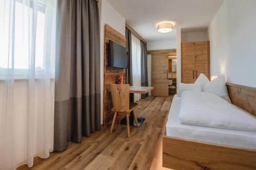 Postel nebo postele na pokoji v ubytování Kopeindlgut Apartments