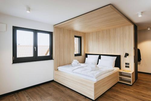 Llit o llits en una habitació de mein-schlafplatz - Leben - Arbeiten - Wohnen