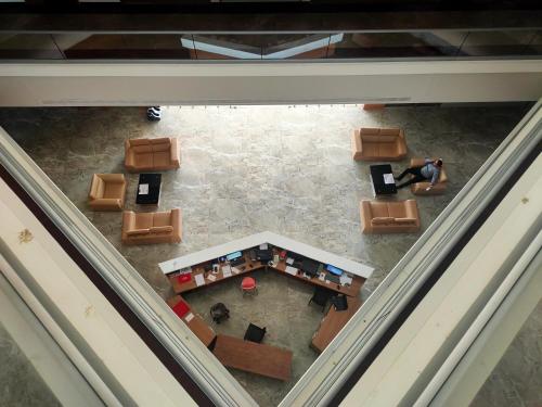 an overhead view of a room with a table and chairs at VITS The Somnath Gateway in Somnath