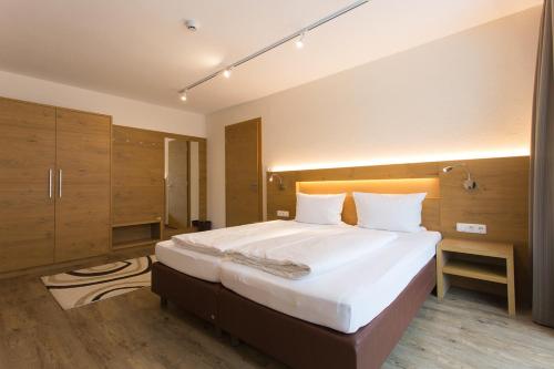 Postel nebo postele na pokoji v ubytování Hotel Rundeck