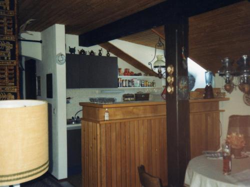 a kitchen with a counter and a sink in a room at Feichtenhof in Siegsdorf