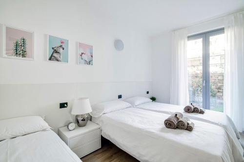 Cama o camas de una habitación en Silvia Ossuccio House - The House Of Travelers