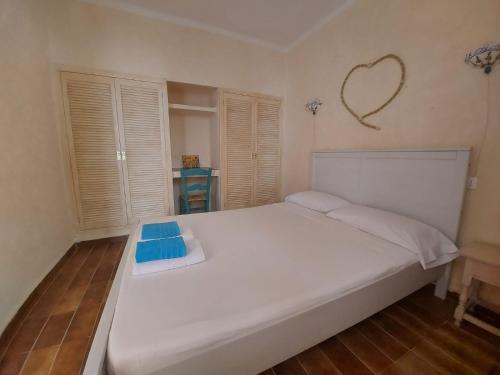 Ένα ή περισσότερα κρεβάτια σε δωμάτιο στο Edificio RexII