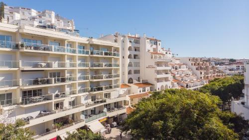 an apartment building in positano positano italy at Histórical City Center Penthouse Albufeira in Albufeira
