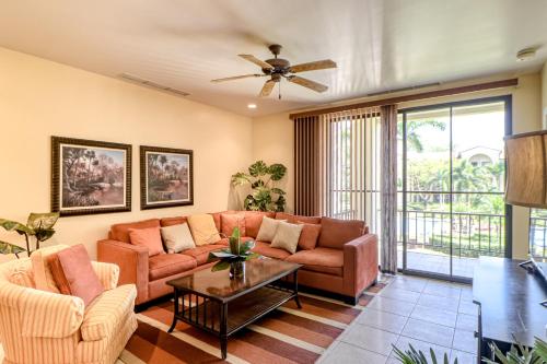 a living room with a couch and a table at Pacifico Lifestyle L1009 in Coco