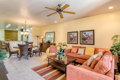 a living room with a couch and a ceiling fan at Pacifico Lifestyle L1009 in Coco