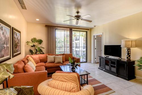 a living room with a couch and a tv at Pacifico Lifestyle L1009 in Coco