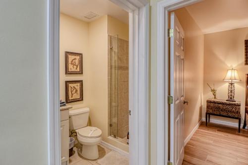 a bathroom with a toilet and a shower at Pacifico Lifestyle L1009 in Coco