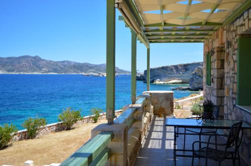 a balcony with a view of the ocean at Remezzo Kimolos in Kimolos