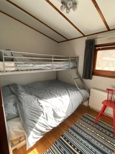 Двухъярусная кровать или двухъярусные кровати в номере Chalet de kleine Eekhoorn