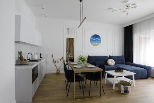 Kuchyň nebo kuchyňský kout v ubytování Enklawa Mielno apartamenty przy plaży