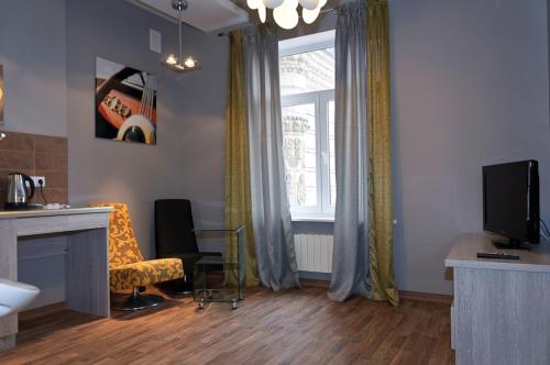 TV a/nebo společenská místnost v ubytování Partner Guest House Khreschatyk