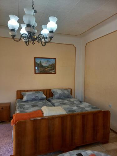 En eller flere senger på et rom på Apartments Iles