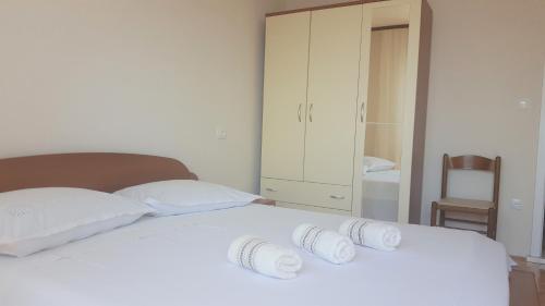 Postel nebo postele na pokoji v ubytování Adriatic Beach Suites
