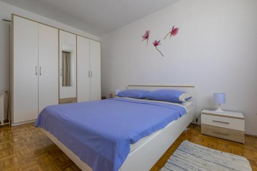 Postel nebo postele na pokoji v ubytování HRUSTA