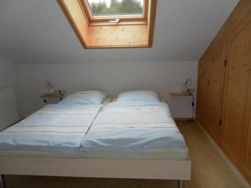 Cama o camas de una habitación en Ferienwohnungen Brunner