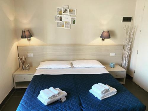 Postel nebo postele na pokoji v ubytování Hotel Alabama