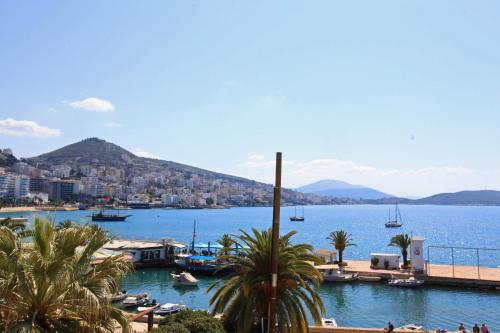 a view of a harbor with boats in the water at Hotel Real in Sarandë