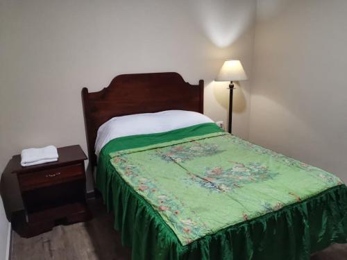 מיטה או מיטות בחדר ב-Hotel Guest House Inn