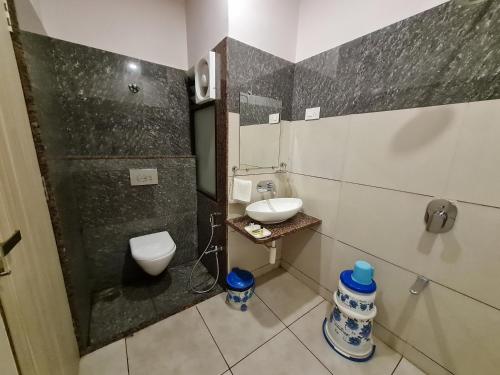 Salle de bains dans l'établissement HOTEL SHIV SHAKTI