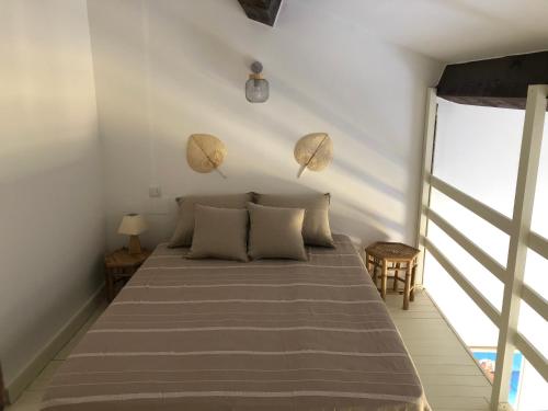 Кровать или кровати в номере Le Relais de Sisco
